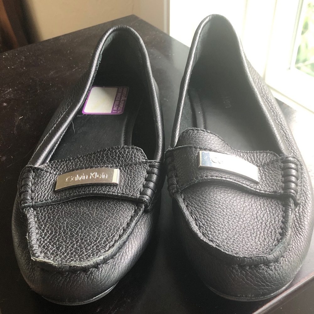 Calvin Klein moccasin type black flats size 7